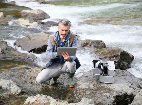 Man using Environmental Monitoring Equipment