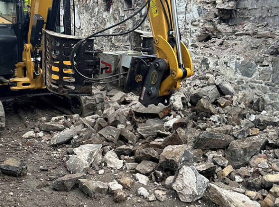 Digger Clearing a Site