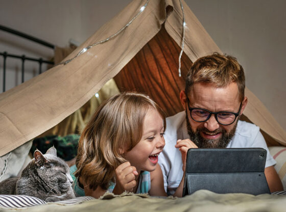 Man playing with his kid